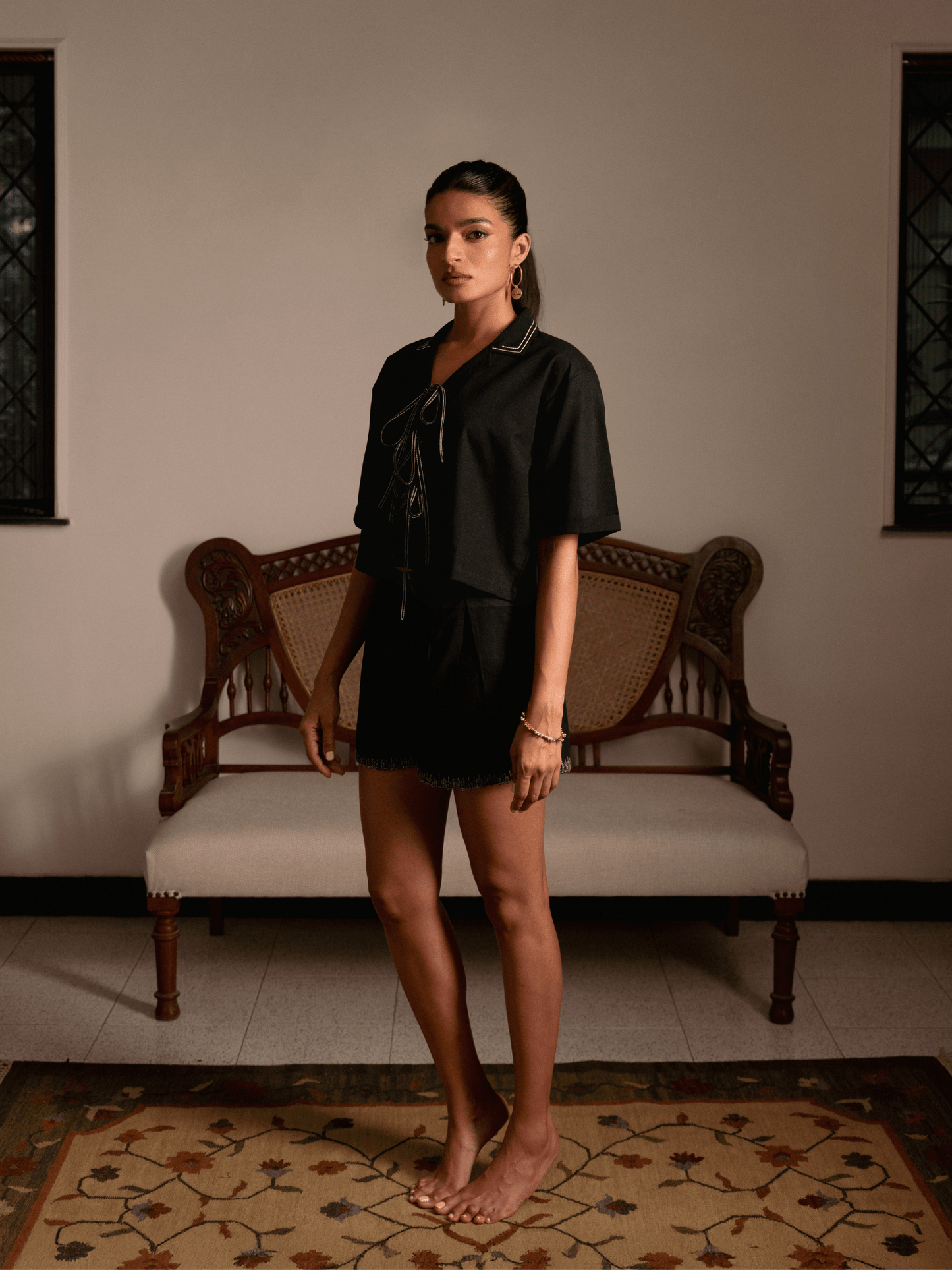 Designer black oversized cropped shirt with tie-front detailing